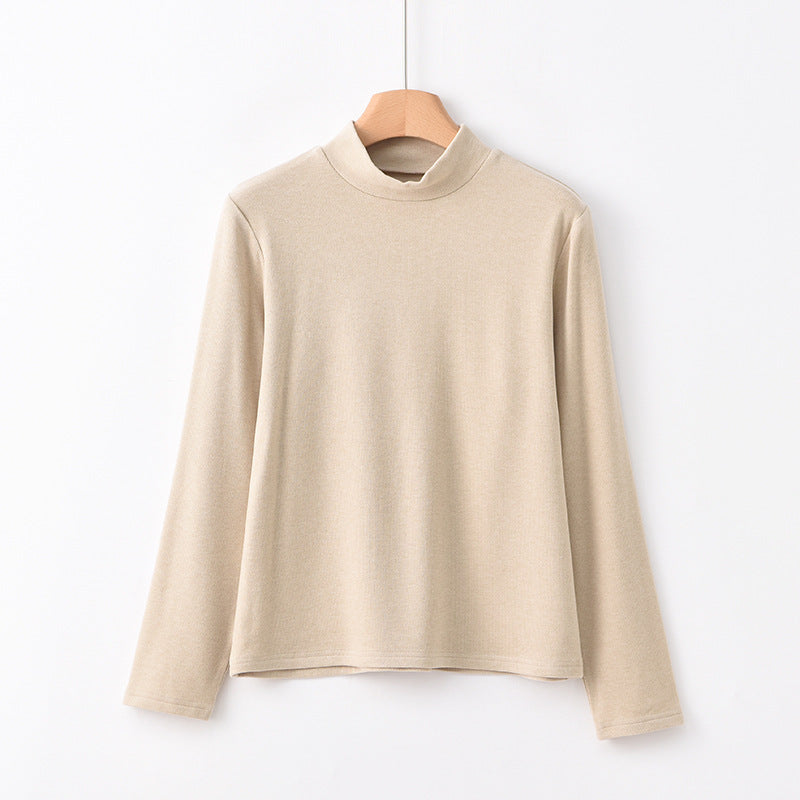Warm knitted pullover with stand-up collar