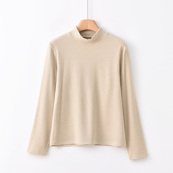Warm knitted pullover with stand-up collar