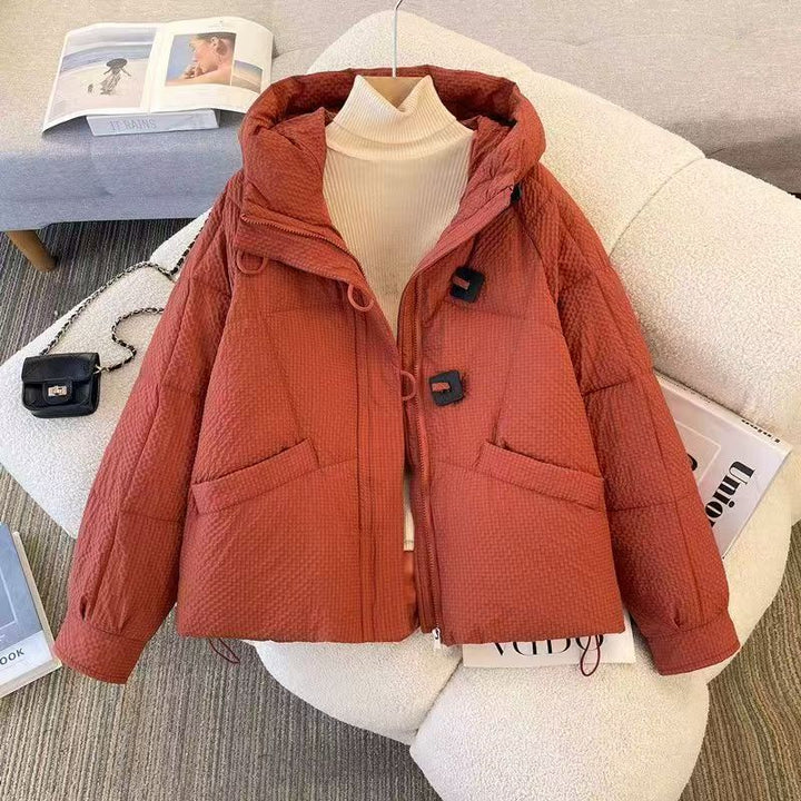 Short women's quilted jacket with hood, loose fit