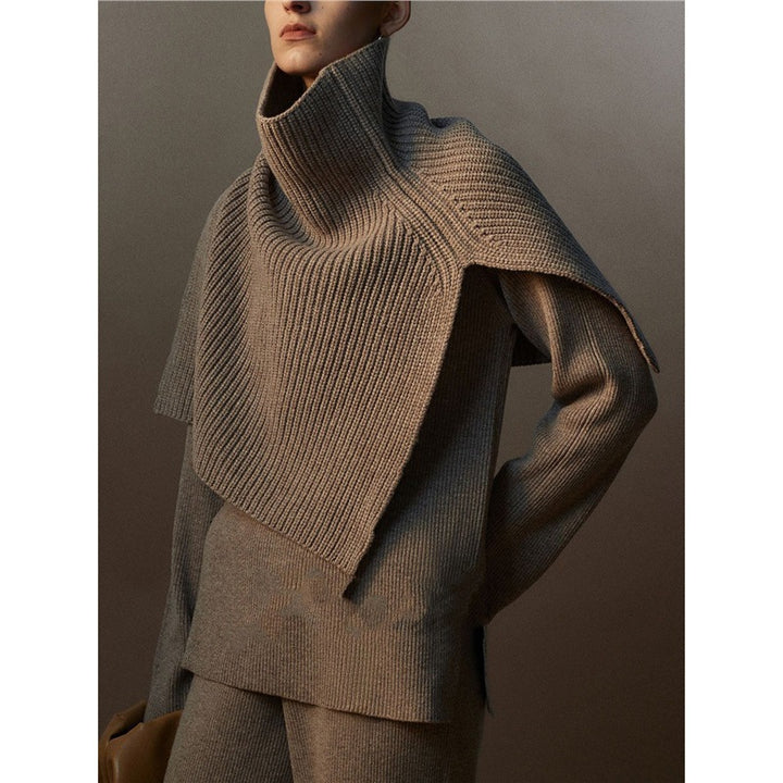 Knitted shoulder warmer made of merino wool with slit