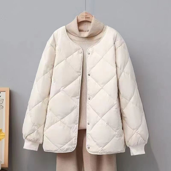 Light women's quilted jacket with diamond pattern