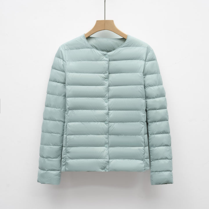 Light women's quilted jacket with round neckline