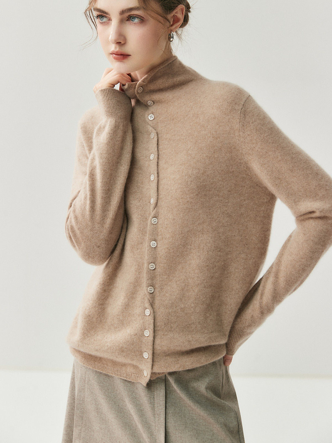 Women's cardigan with roll neck and button placket