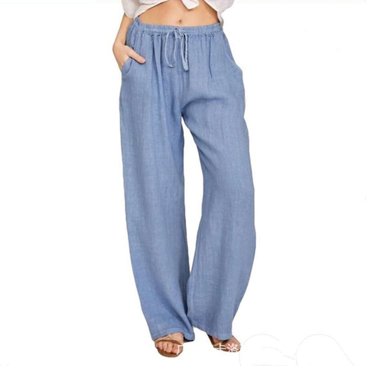 Women's relaxed linen pants with elastic waistband, drawstring, and side pockets Mune Fashion