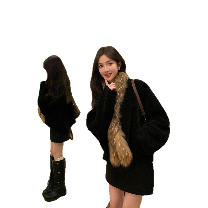Lamb fleece coat with raccoon fur collar