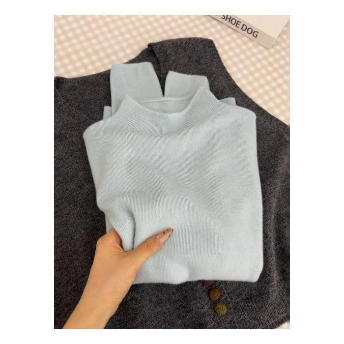 Women's knit sweater with stand-up collar, solid color