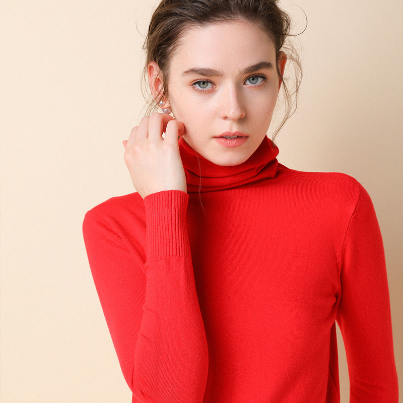 Women's knitted pullover with stand collar and geometric pattern