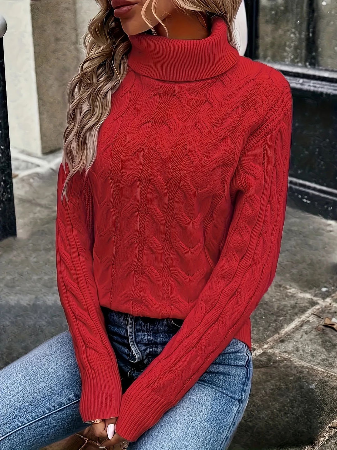 Knit sweater with cable pattern and high collar