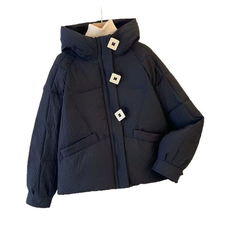 Short women's quilted jacket with hood, loose fit