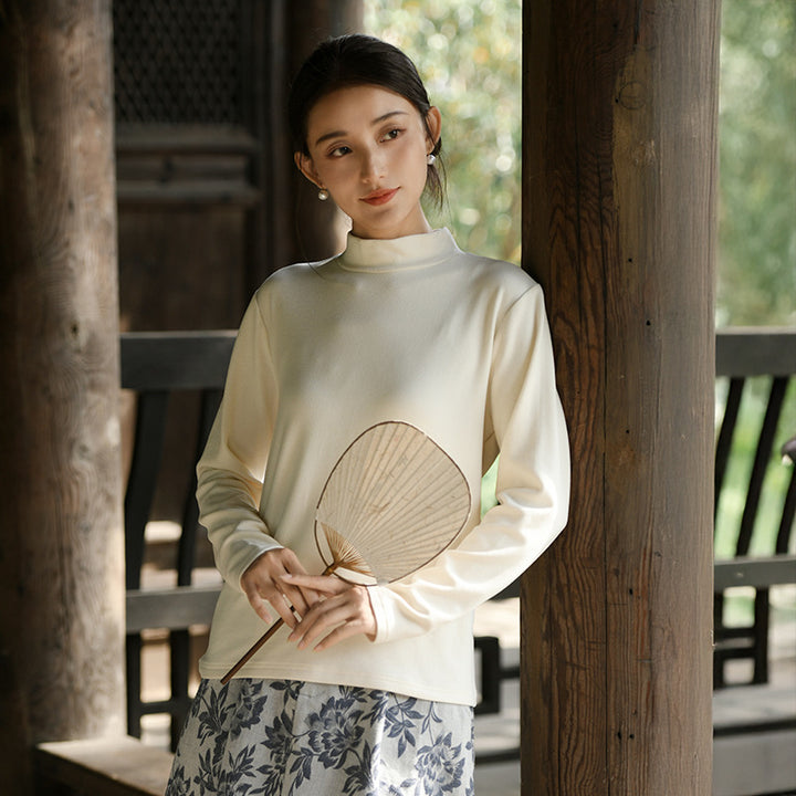 Warm knitted pullover with stand-up collar
