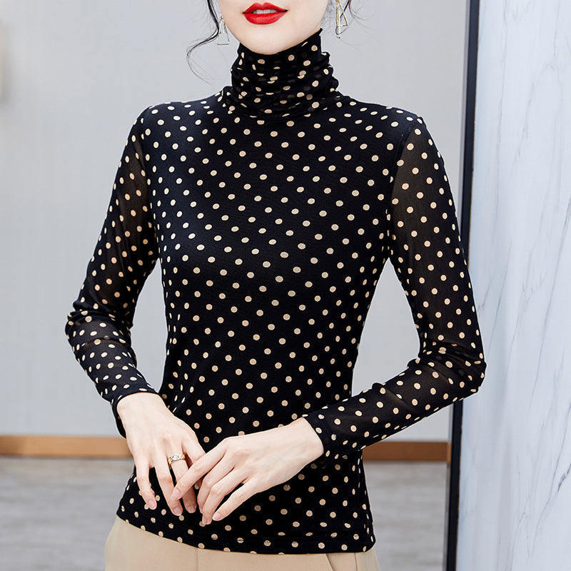Women's top with stand collar and polka dot pattern