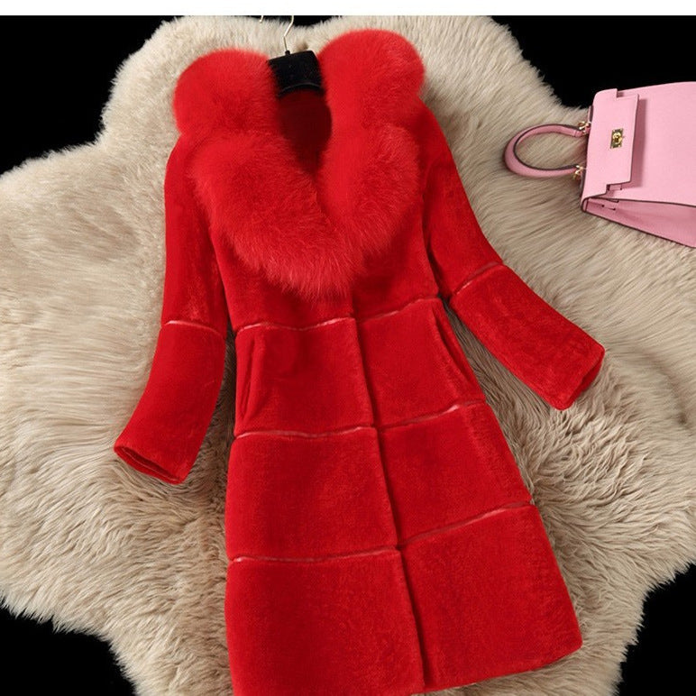Women's coat made of sheared lambskin with faux fur collar