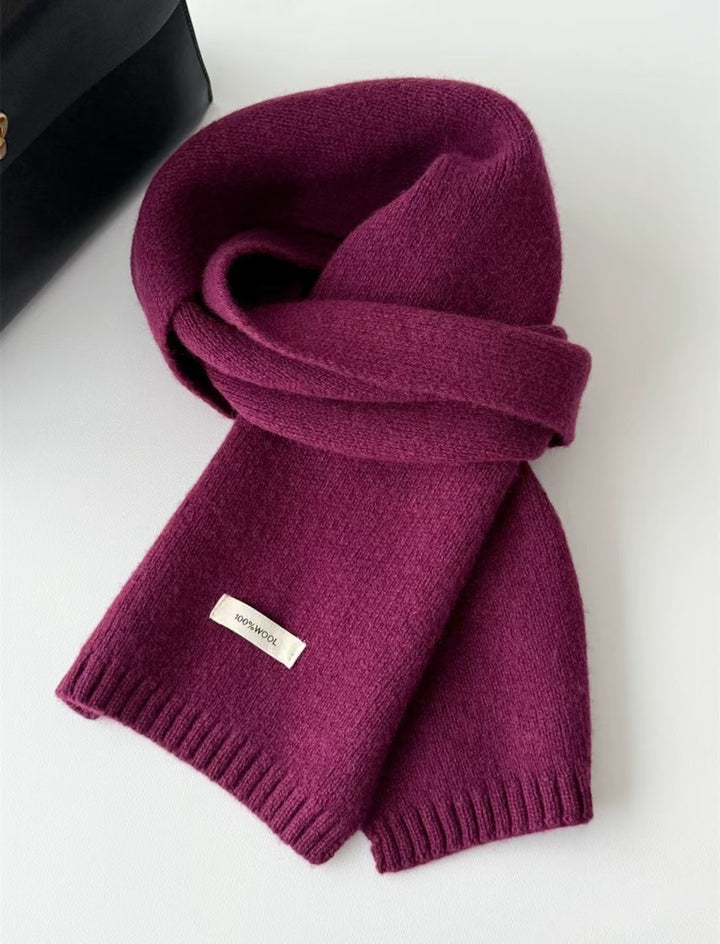 Simple knitted scarf made of pure wool