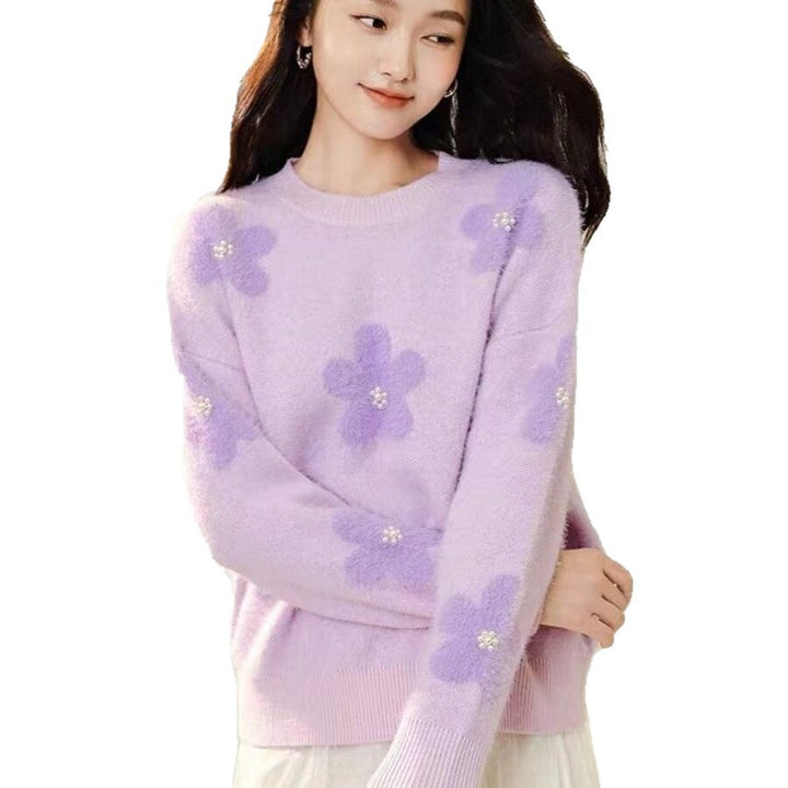 Women's knitted pullover with floral pattern and pearl trim