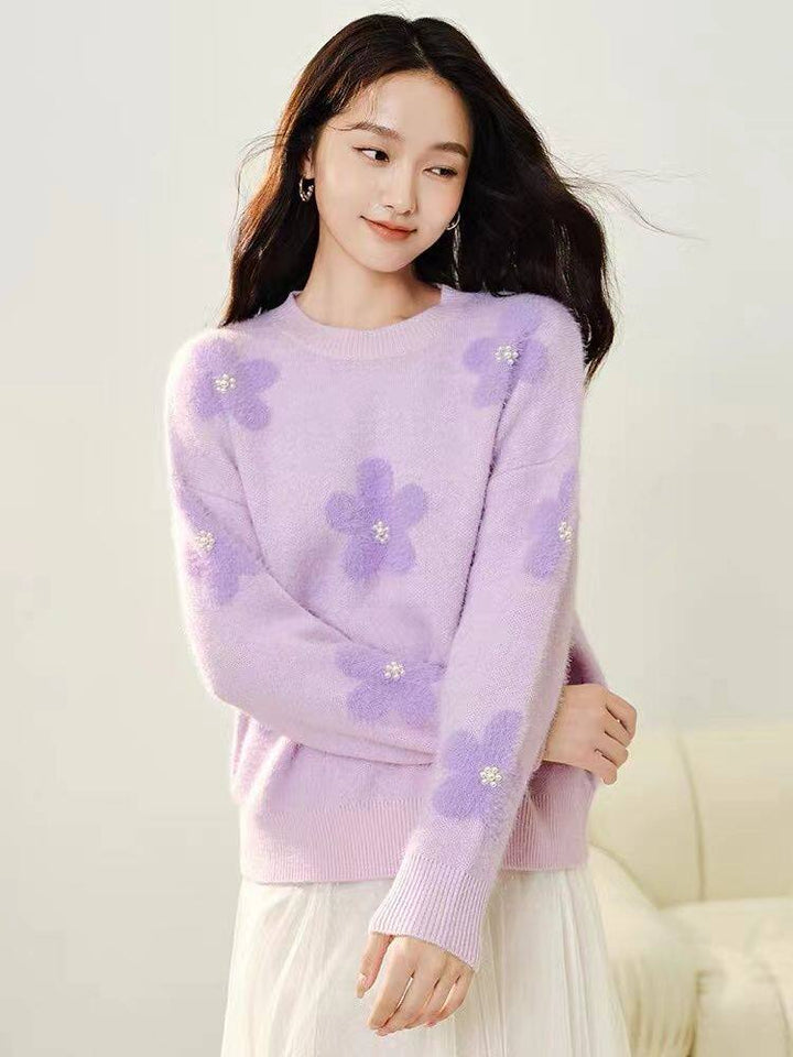 Women's knitted pullover with floral pattern and pearl trim