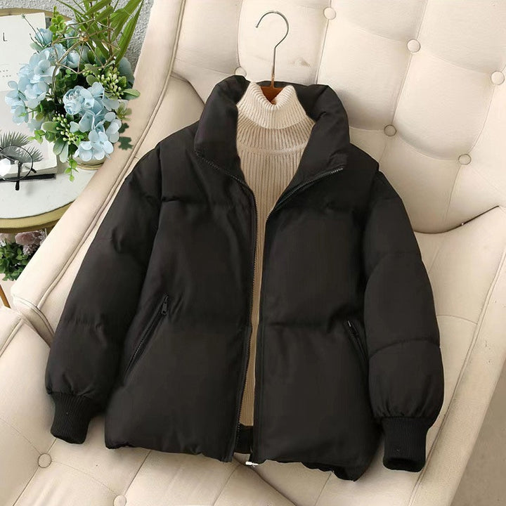 Short women's winter jacket with ribbed cuffs