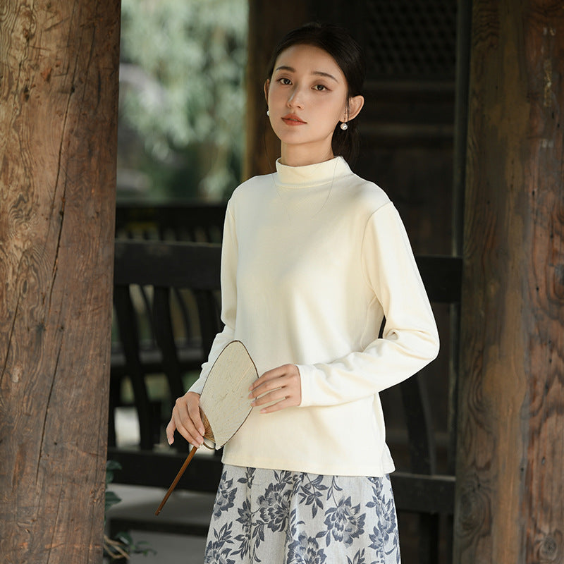 Warm knitted pullover with stand-up collar