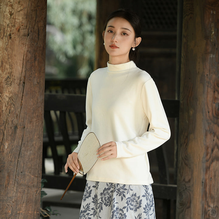 Warm knitted pullover with stand-up collar