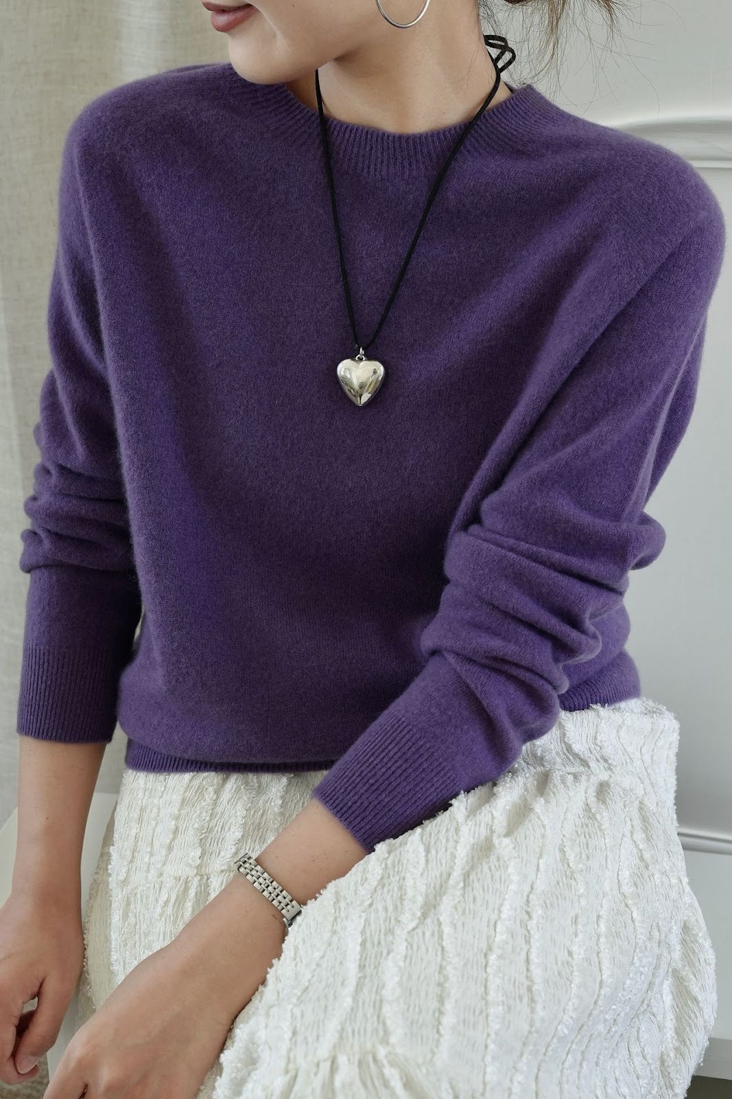 Women's wool sweater with stand-up collar, loosely knitted