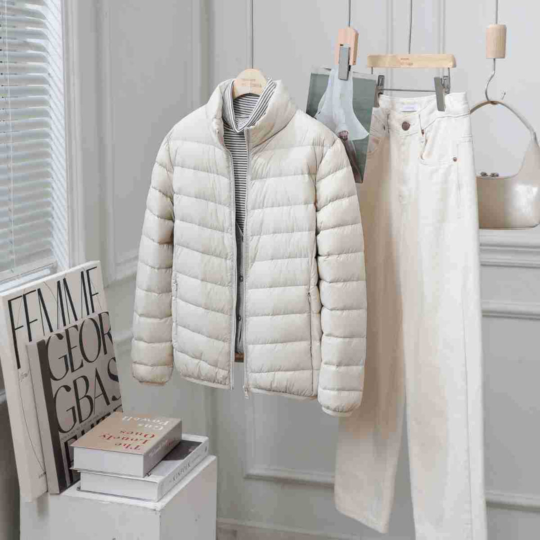 Light women's down jacket with stand-up collar, white duck down