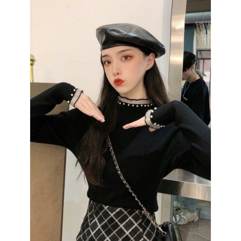 Ladies' knitted sweater with stand-up collar, lace and pearls