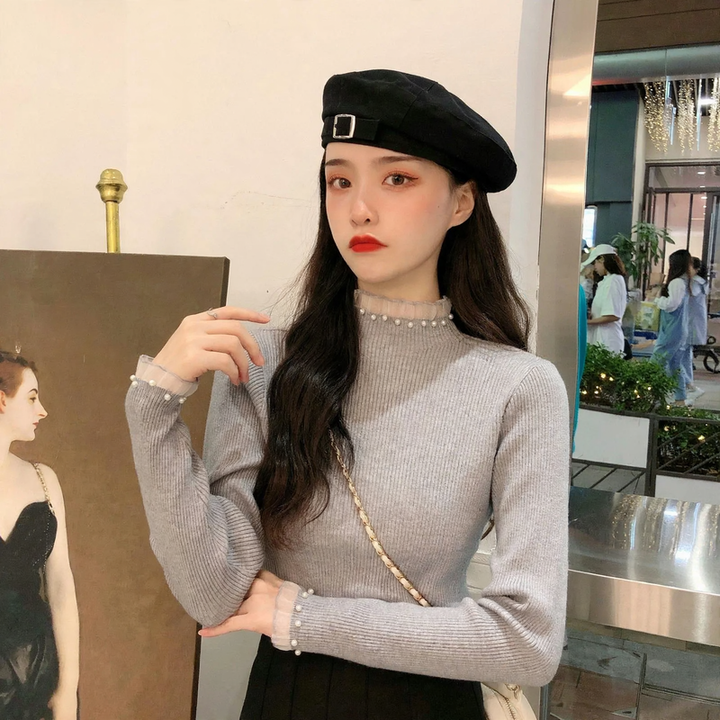 Ladies' knitted sweater with stand-up collar, lace and pearls