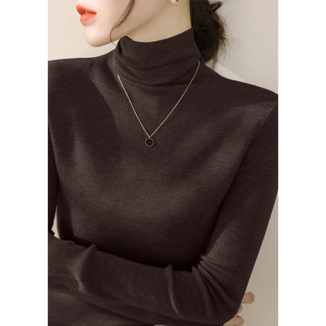 Women's knitted sweater, fitted, with stand-up collar