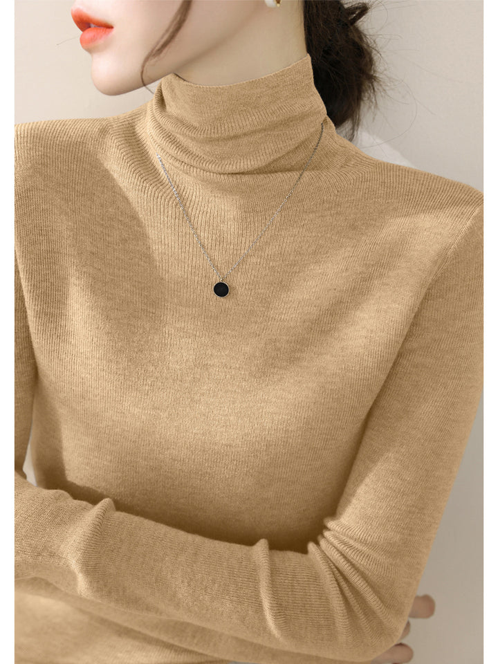 Women's knitted sweater, fitted, with stand-up collar