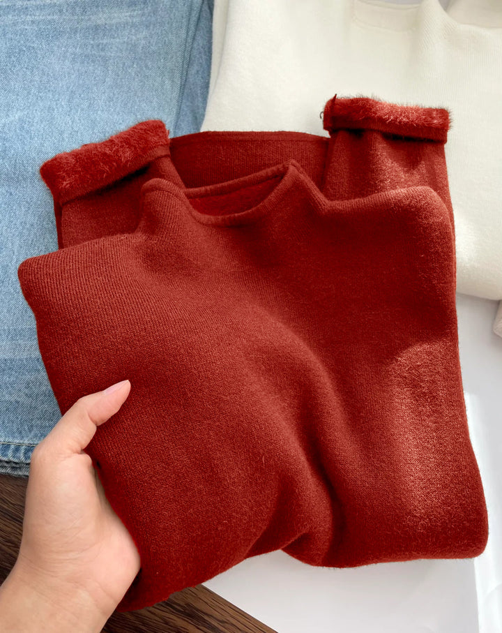 Ladies knitted pullover with stand-up collar, lined
