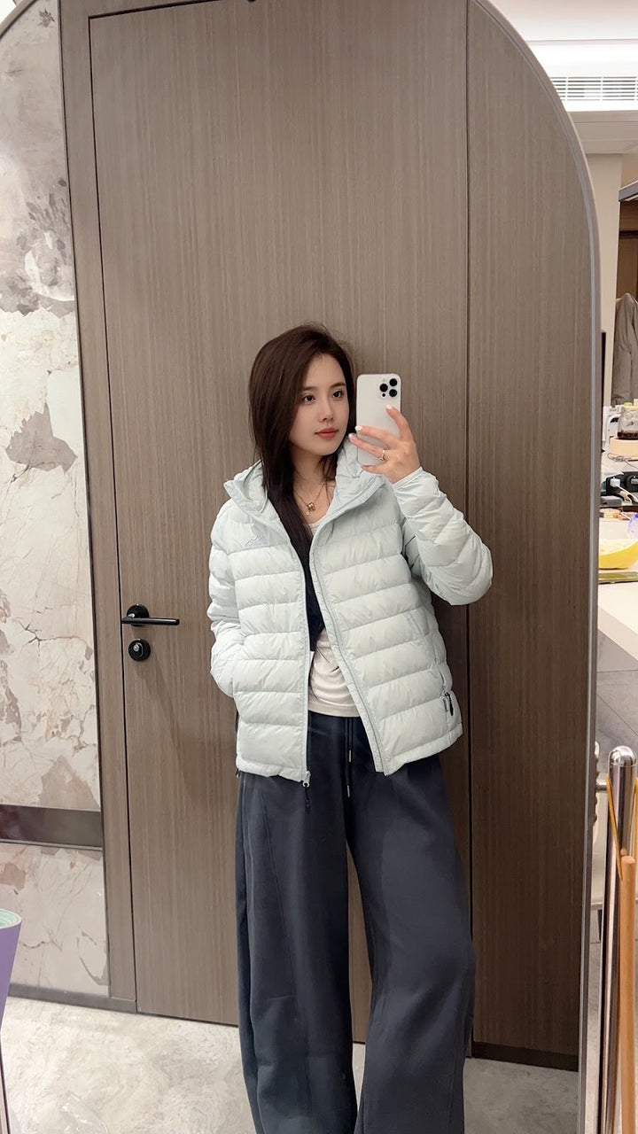 Short women's down jacket with hood