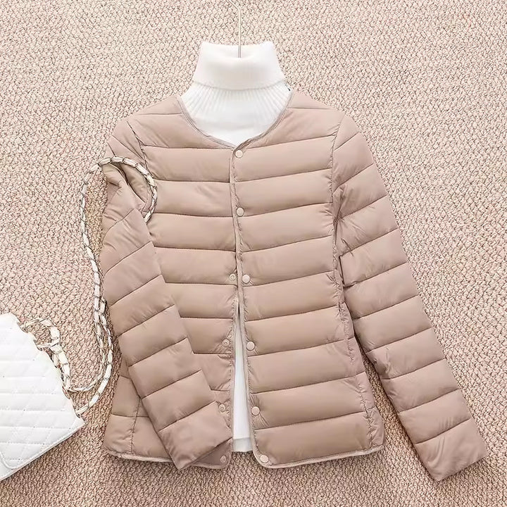 Light women's quilted jacket, short, fitted