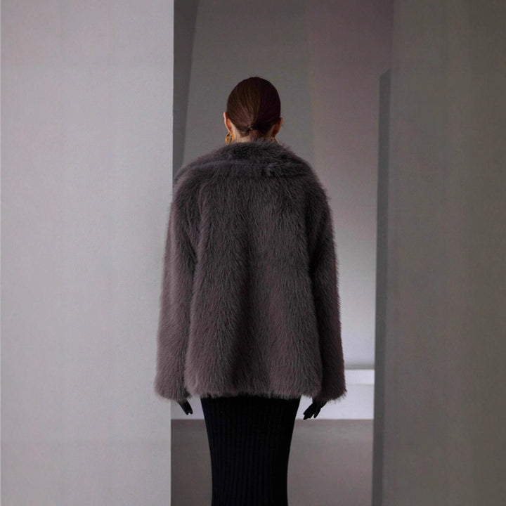 Elegant women's faux fur jacket in solid colors