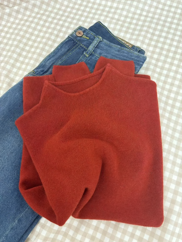 Ladies knitted pullover with stand-up collar, lined