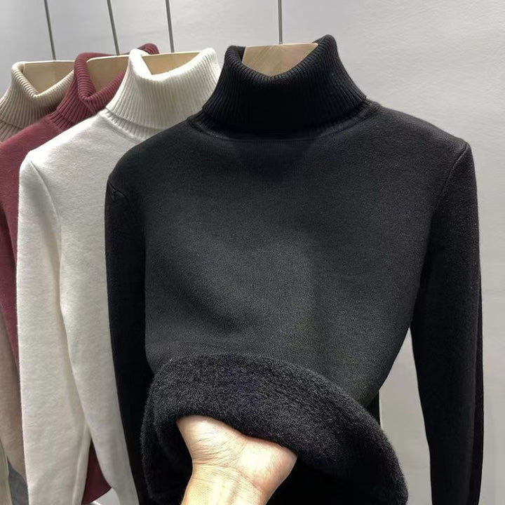 Padded women's knit sweater with high collar