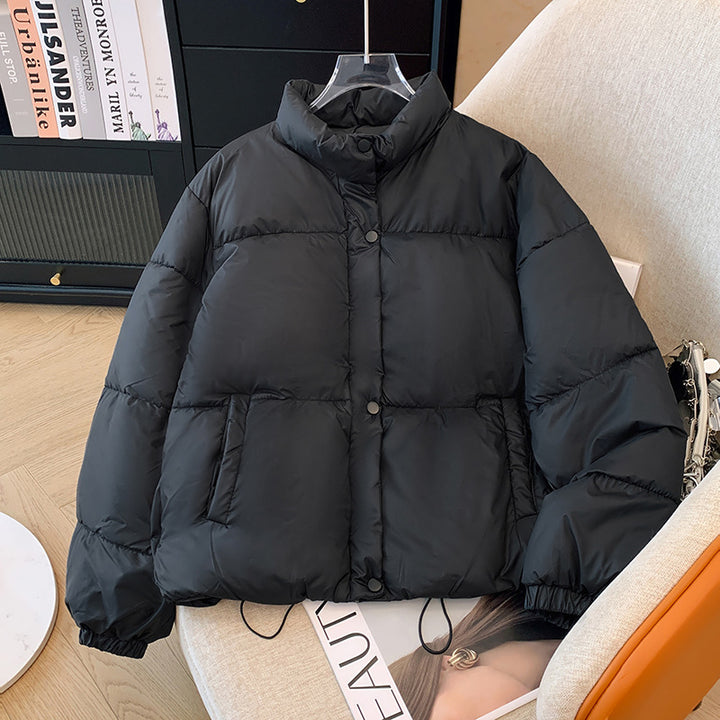 Short women's quilted jacket in a loose fit