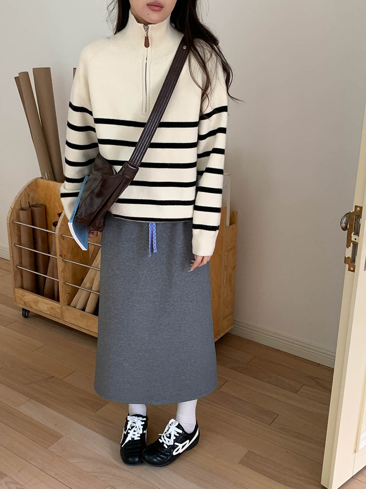 Women's sweater with zipper and stripe pattern