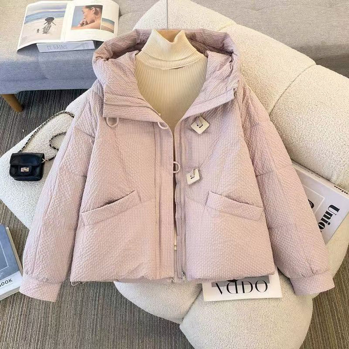 Short women's quilted jacket with hood, loose fit