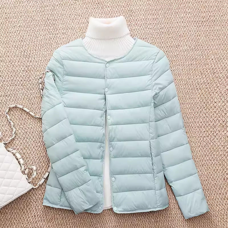 Light women's quilted jacket, short, fitted