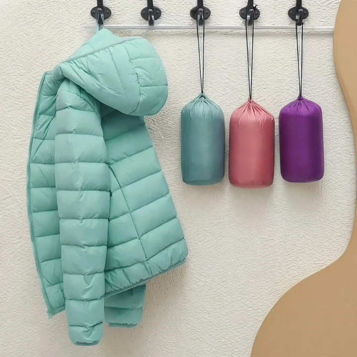 Light women's quilted jacket, short, with hood