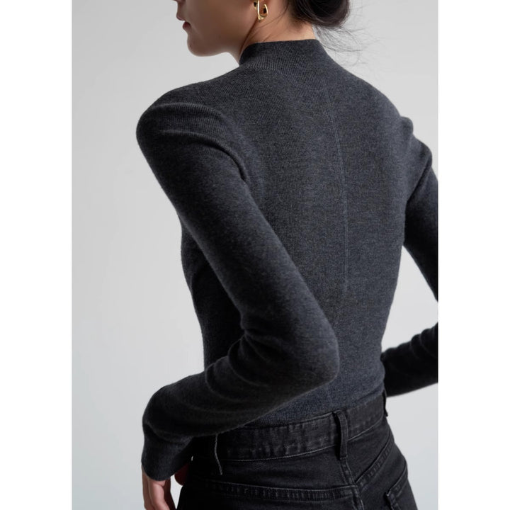 Elegant women's knit sweater with stand-up collar