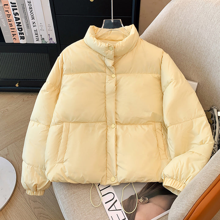 Short women's quilted jacket in a loose fit