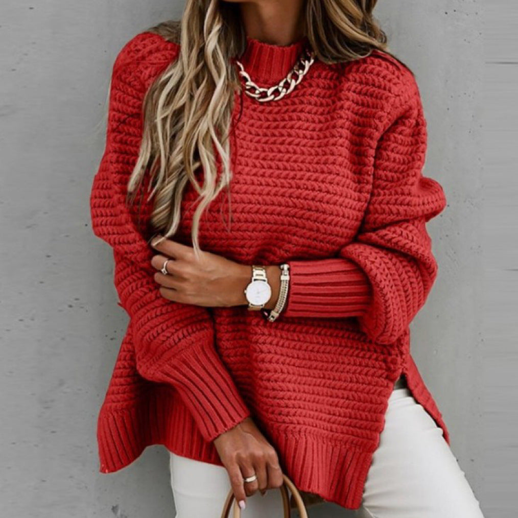 Loose women's knit sweater with cable pattern