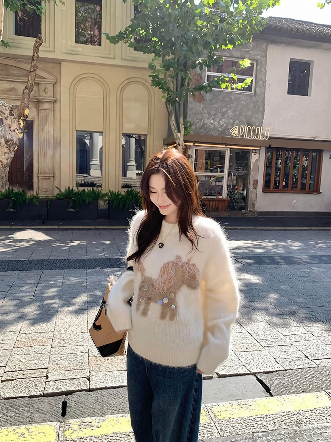 Women's knitted sweater with horse embroidery