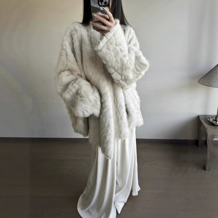 Warmer faux fur coat with bat sleeves