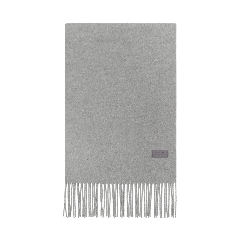 Soft merino wool blend scarf with fringes