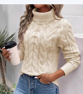Knit sweater with cable pattern and high collar