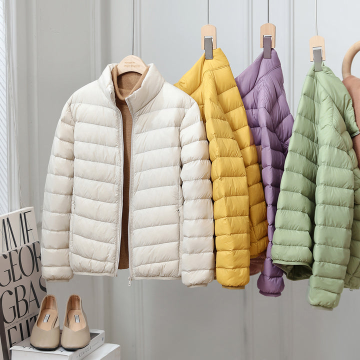 Light women's down jacket with stand-up collar, white duck down