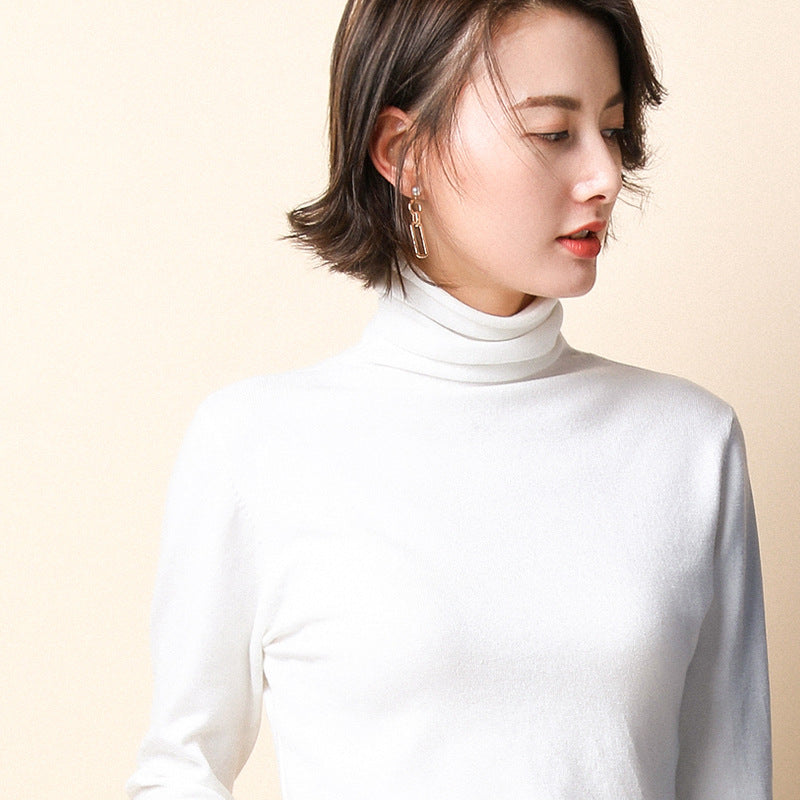 Women's knitted pullover with stand collar and geometric pattern