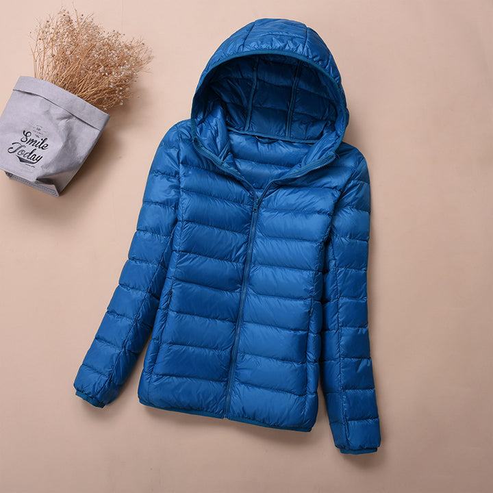 Light women's down jacket, short, with white duck down