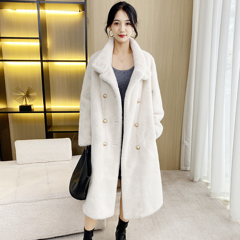 Long women's faux fur coat with stand-up collar
